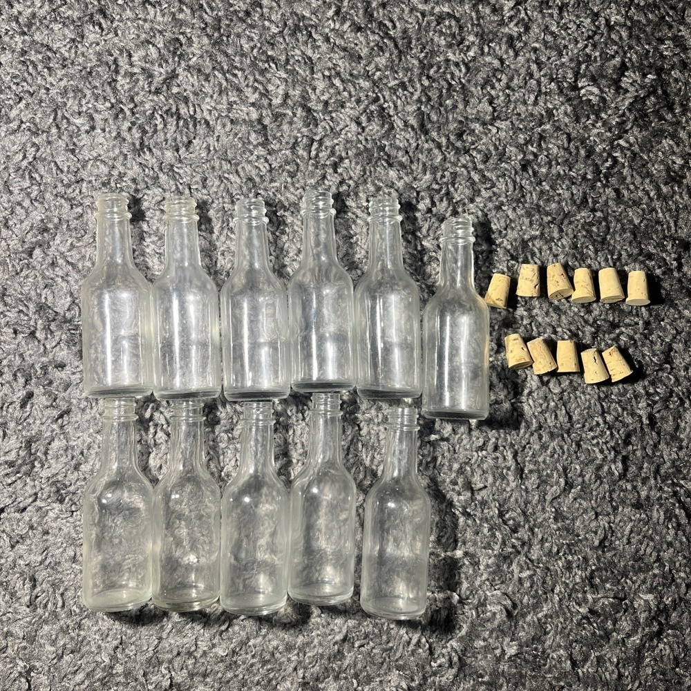 Lot Of 11 mini glass bottles with corks‎
